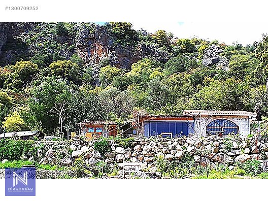Adrasanda Panoromik manzaralı Taş.ev 2336 m2 satılık
